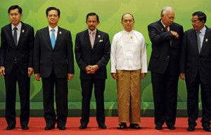 No longer the odd man out. Myanmar President Thein Sein (third from right) with Southeast Asian leaders at the 24th ASEAN summit. Photo by AFP.